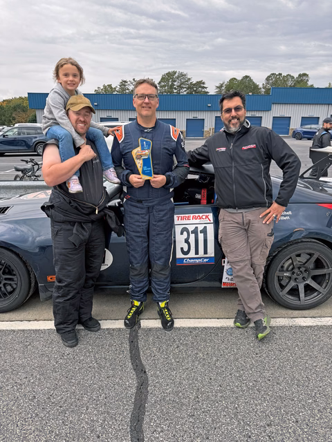 Plan Z Motorsports celebrating a 1st place finish in the EC class