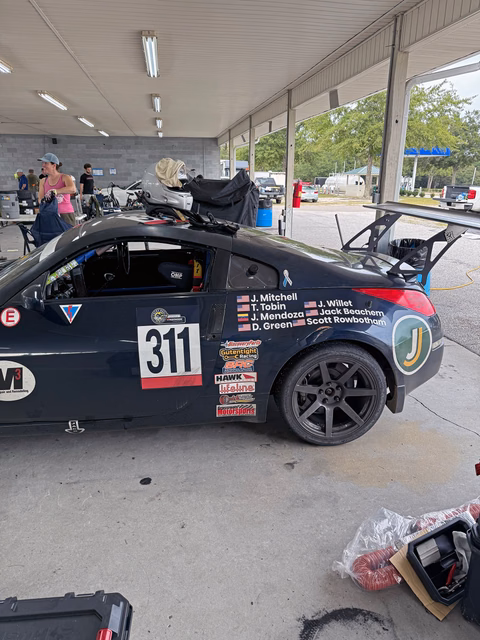 Drivers with the 2007 Nissan 350Z race car