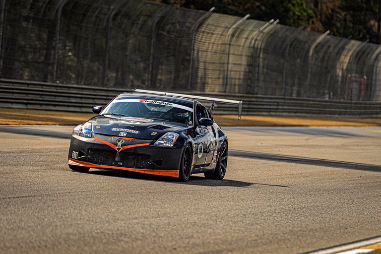 Plan Z Motorsports' dark blue 2007 Nissan 350Z race car
