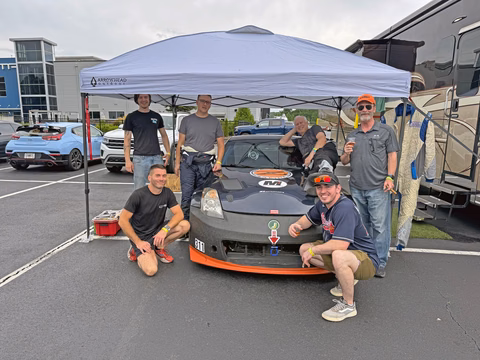 The Plan Z Motorsports team with the 2007 Nissan 350Z