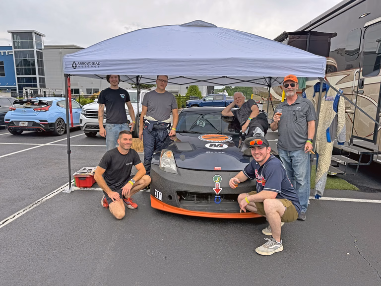 The Plan Z Motorsports team with the 2007 Nissan 350Z